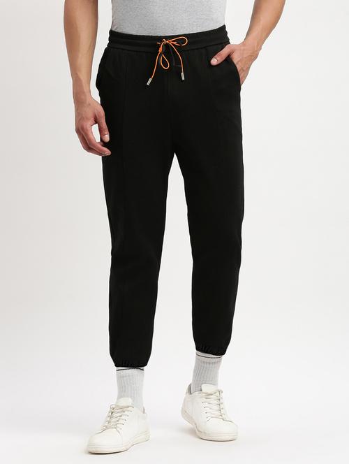 men black solid mid rise full length jogger - 21955897 -  Standard Image - 0
