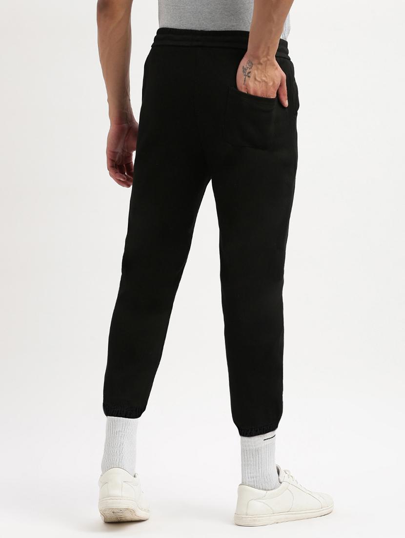 men black solid mid rise full length jogger - 21955897 - Standard Image - 4