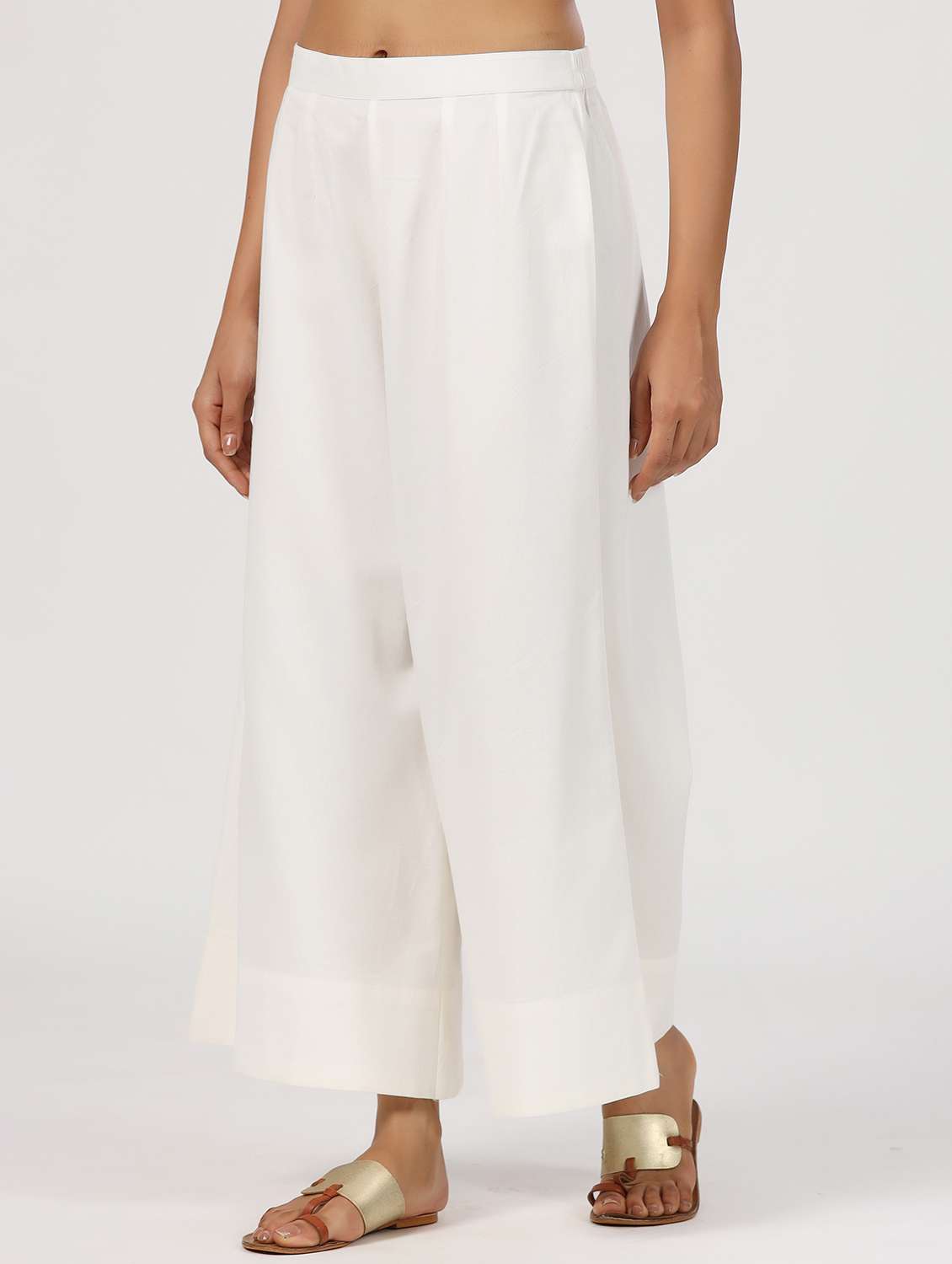 women white solid mid rise flared palazzo - 21956038 - Standard Image - 1