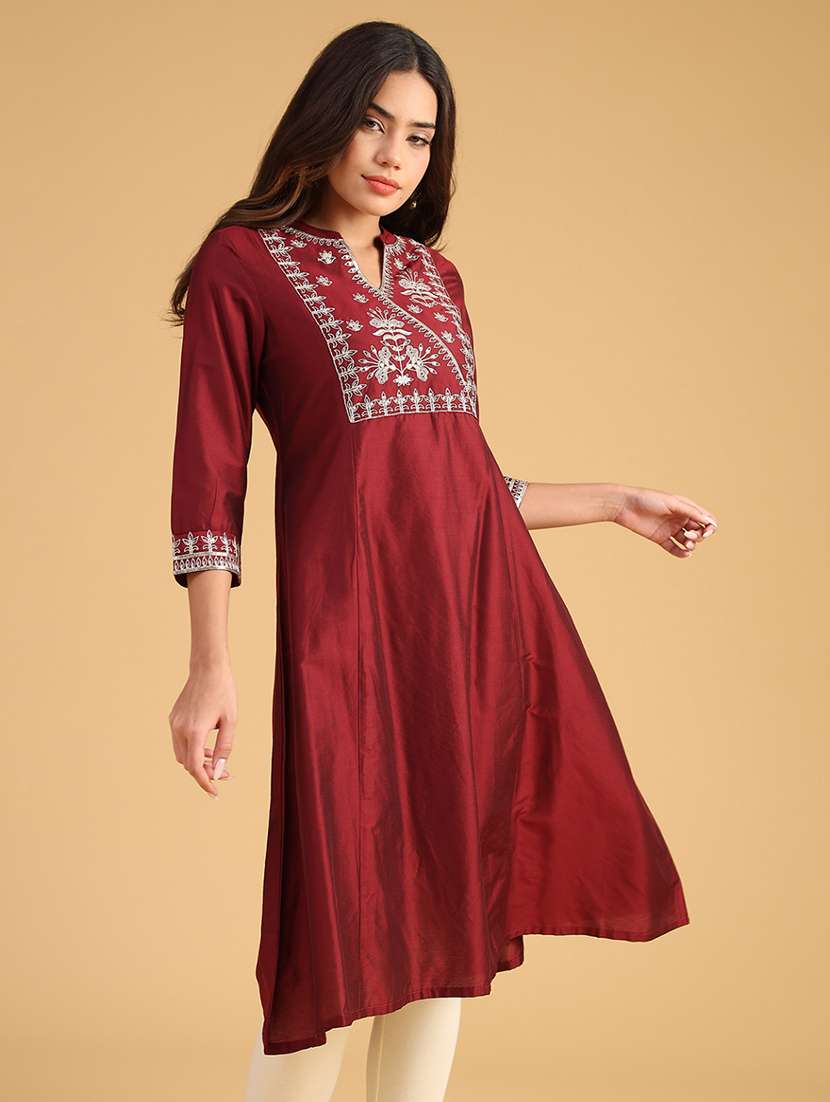 women embroidered three quarter sleeve a-line kurta