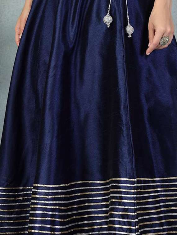 flared skirt with golden stripes - 21956988 -  Standard Image - 1