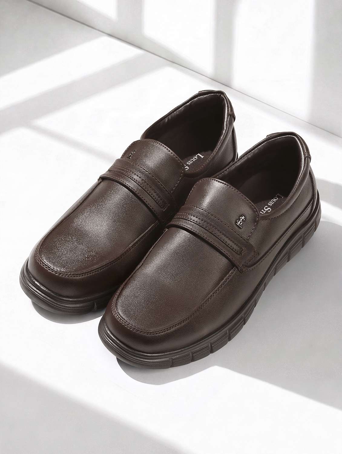 men brown slip on formal shoes