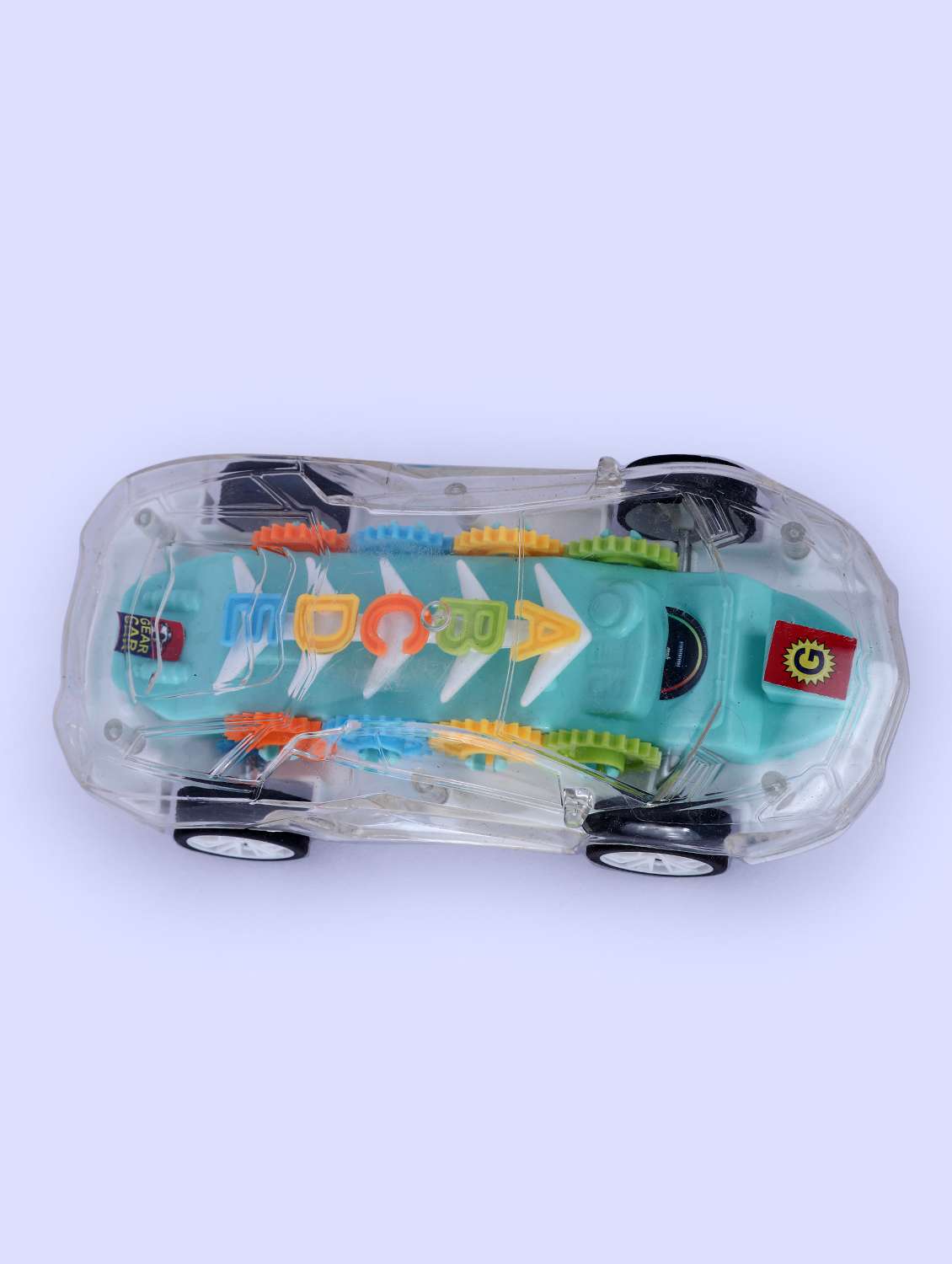 transparent toy car with multi-colored gears - 21958956 -  Standard Image - 1