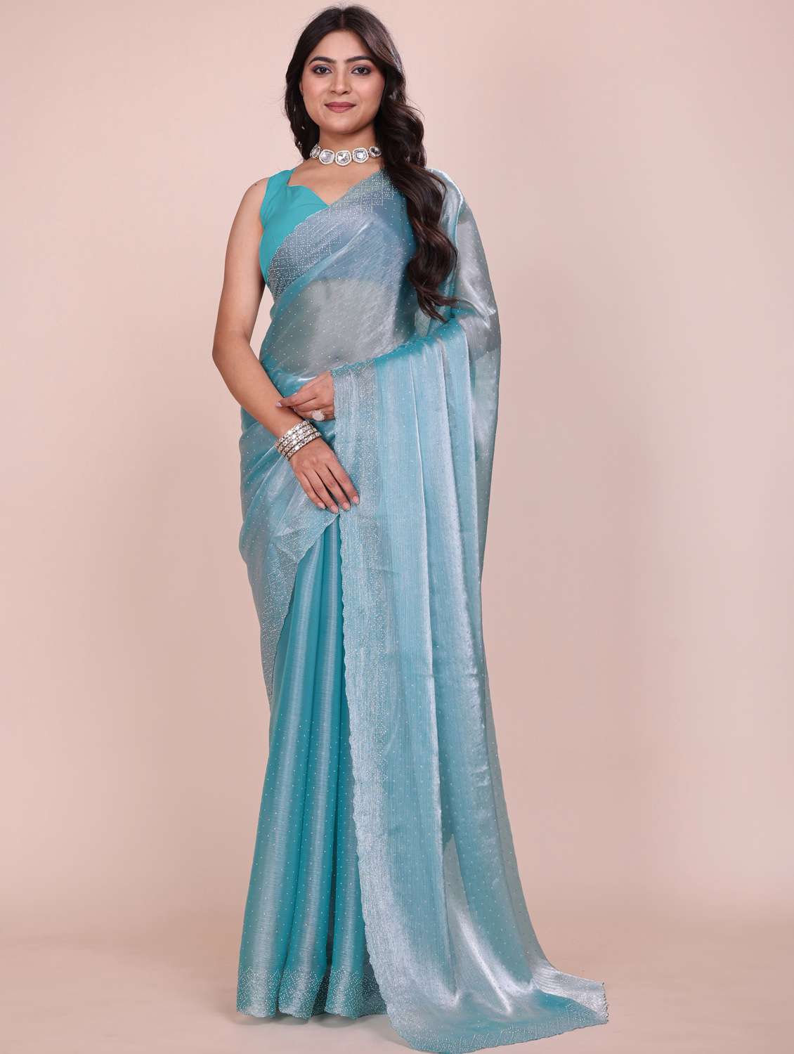 women solid with work embellished saree with blouse