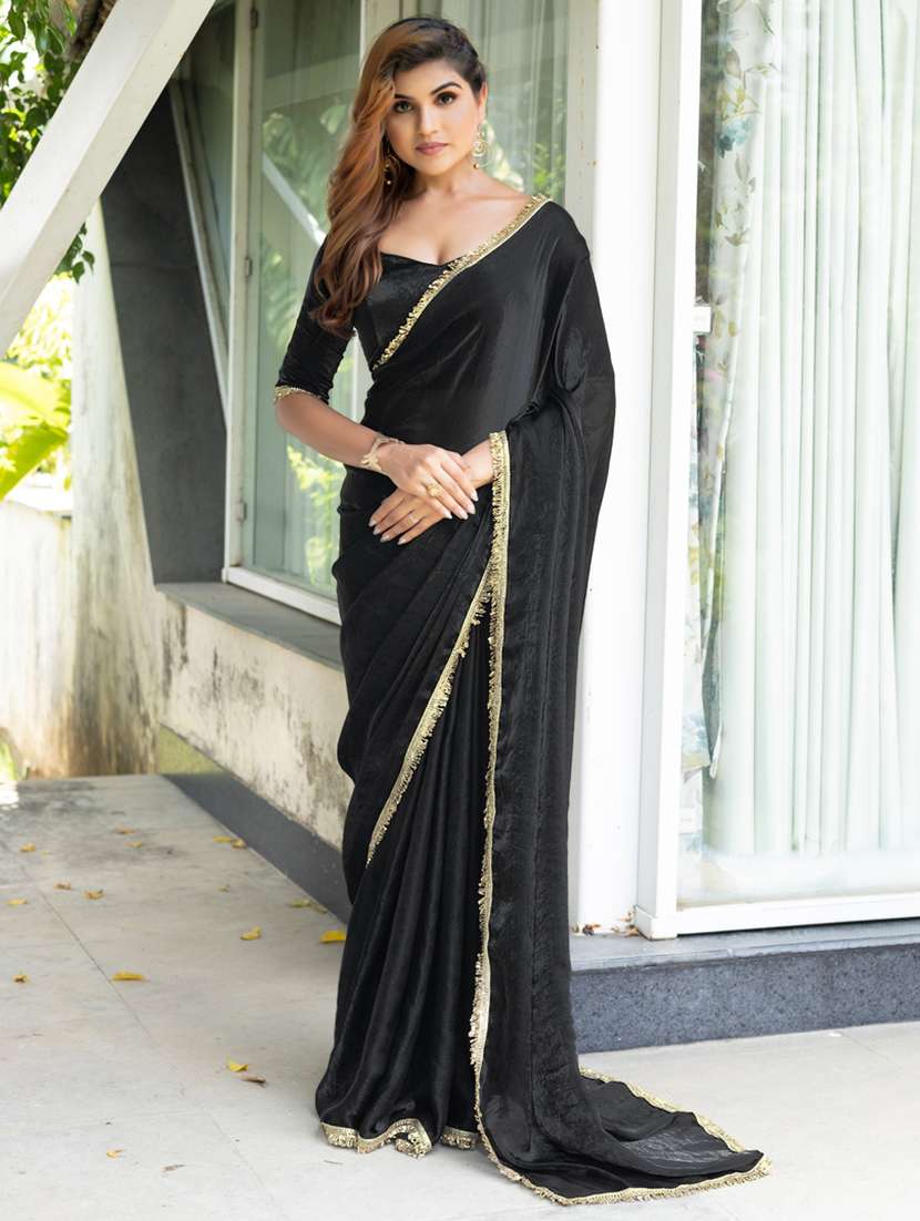 women solid with embellished bordered saree with blouse