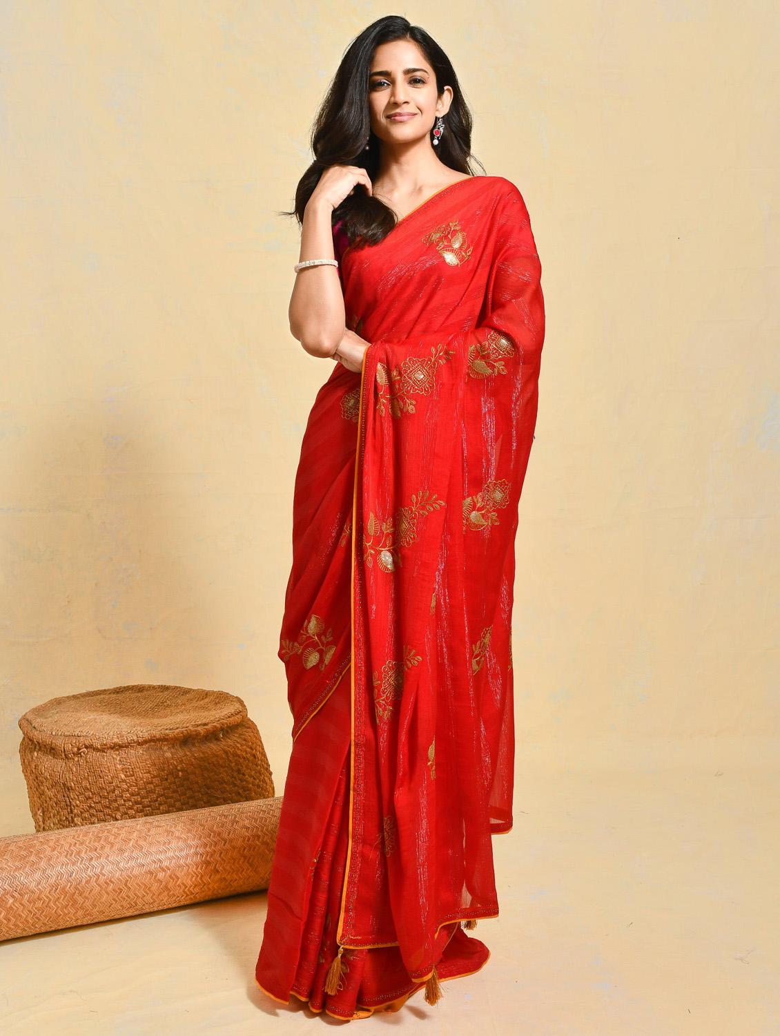 women striped embroidered saree with blouse