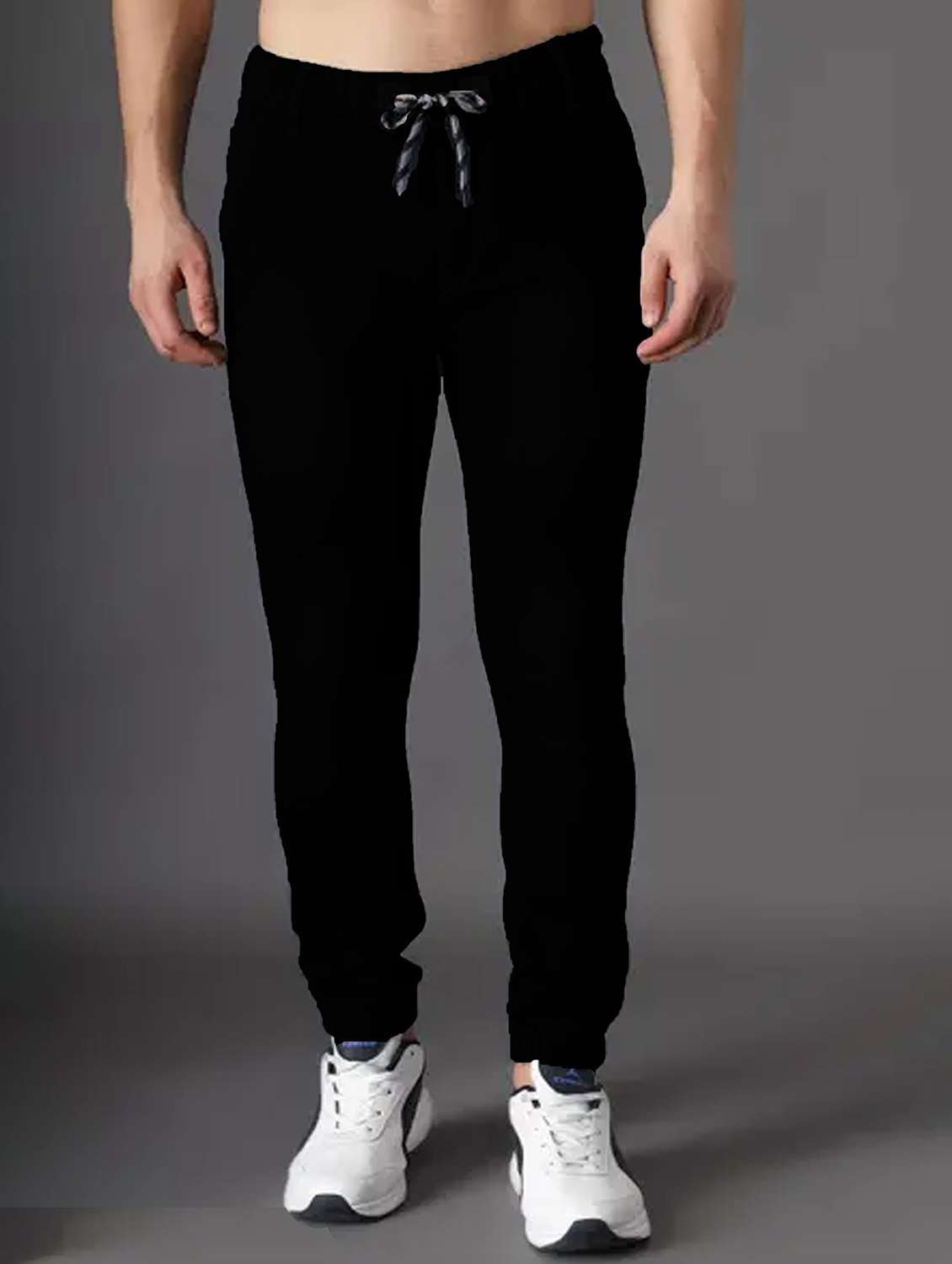 men black solid mid rise slim fit jogger