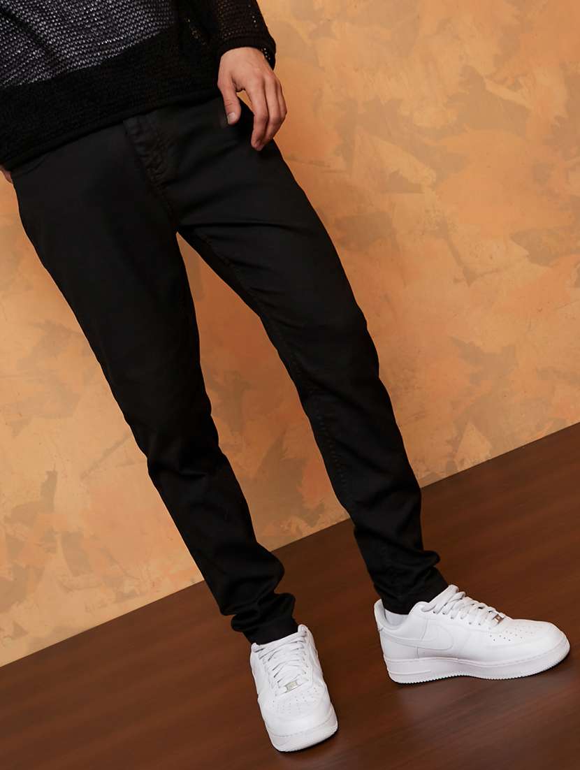 men solid mid rise slim fit jeans