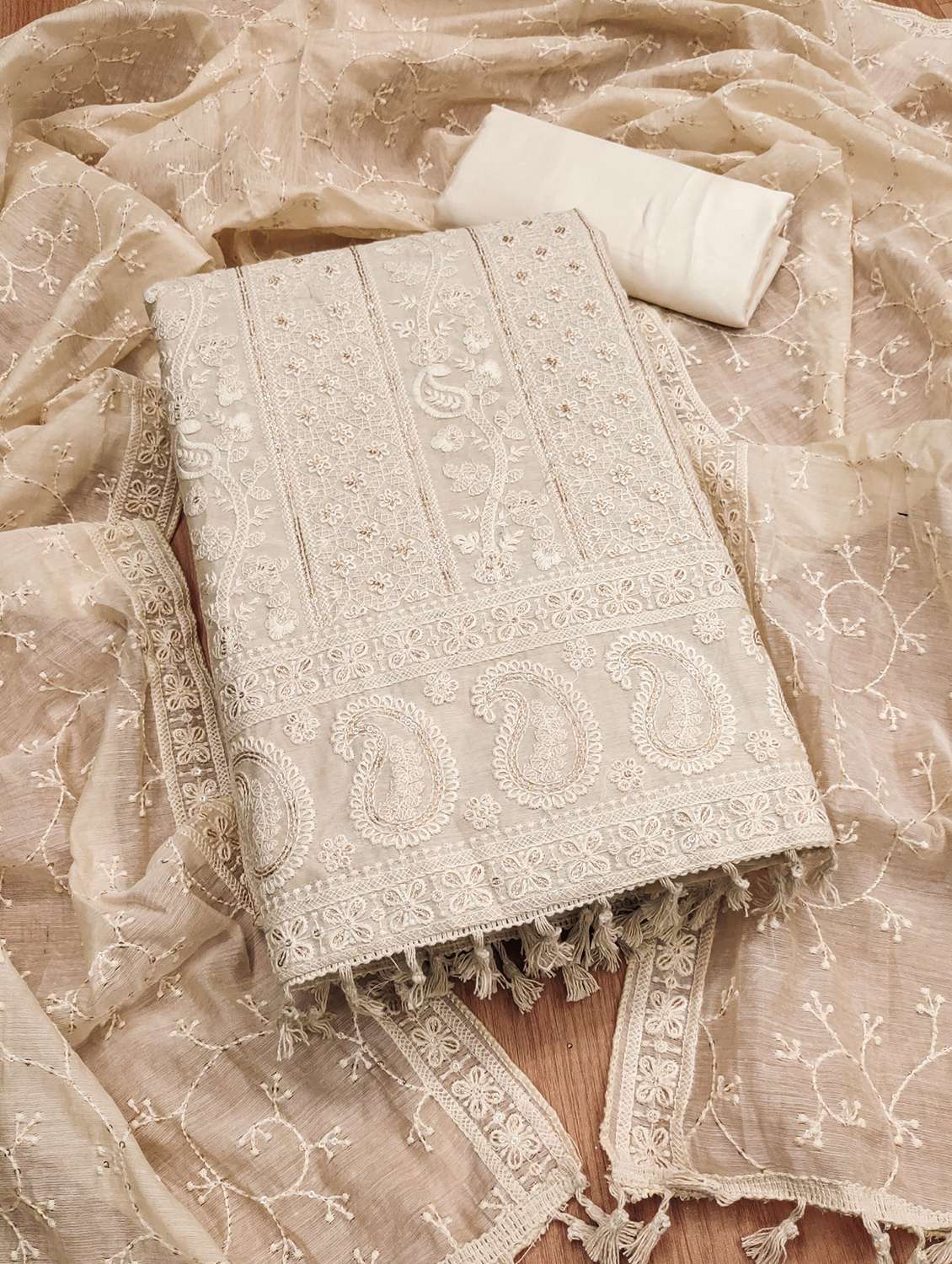 women embroidered unstitched suit set