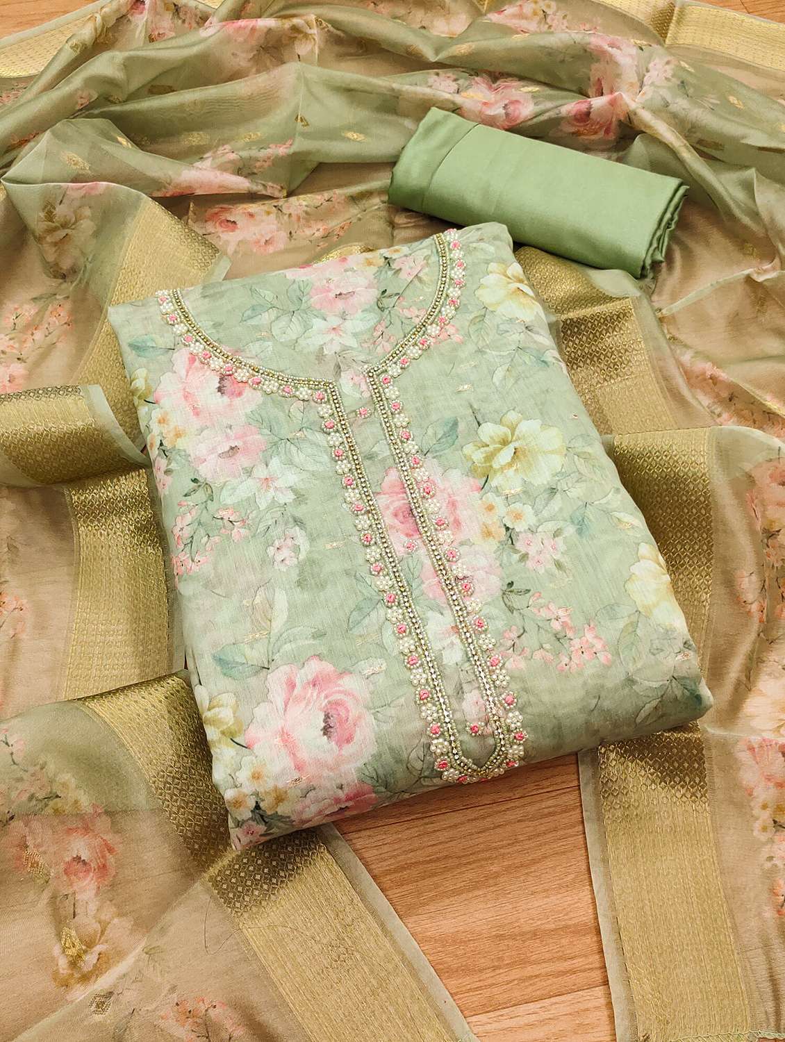 women embroidered unstitched suit set