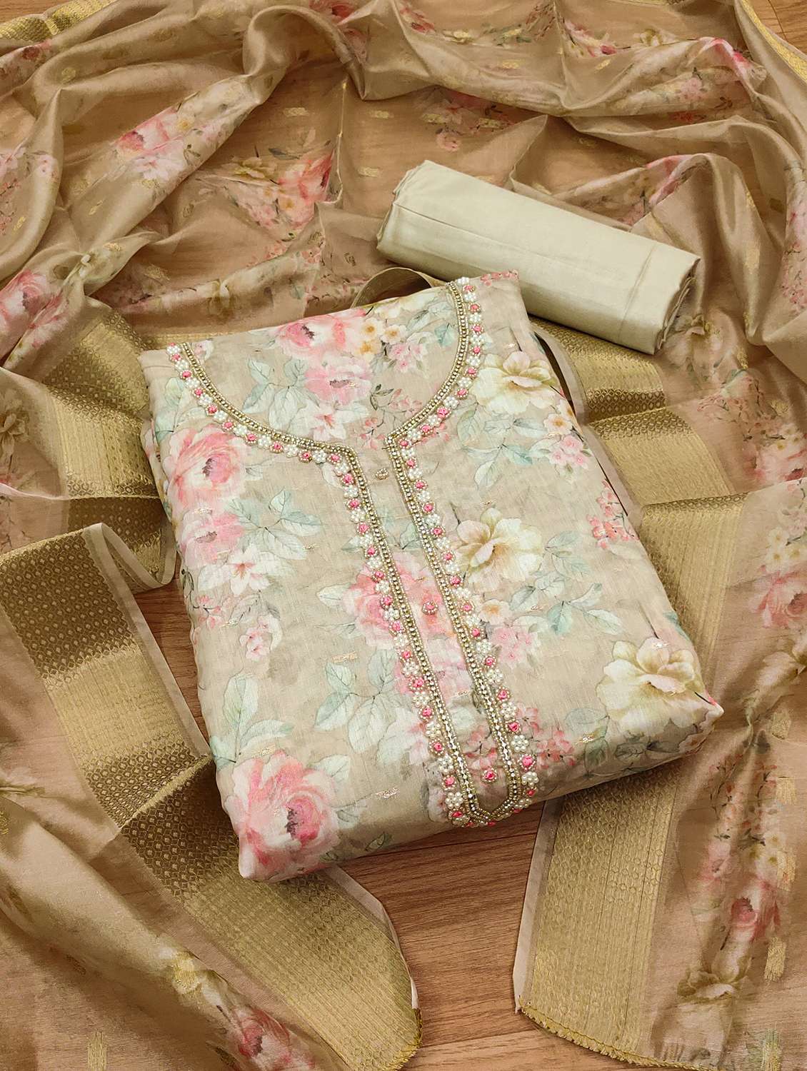 women embroidered unstitched suit set