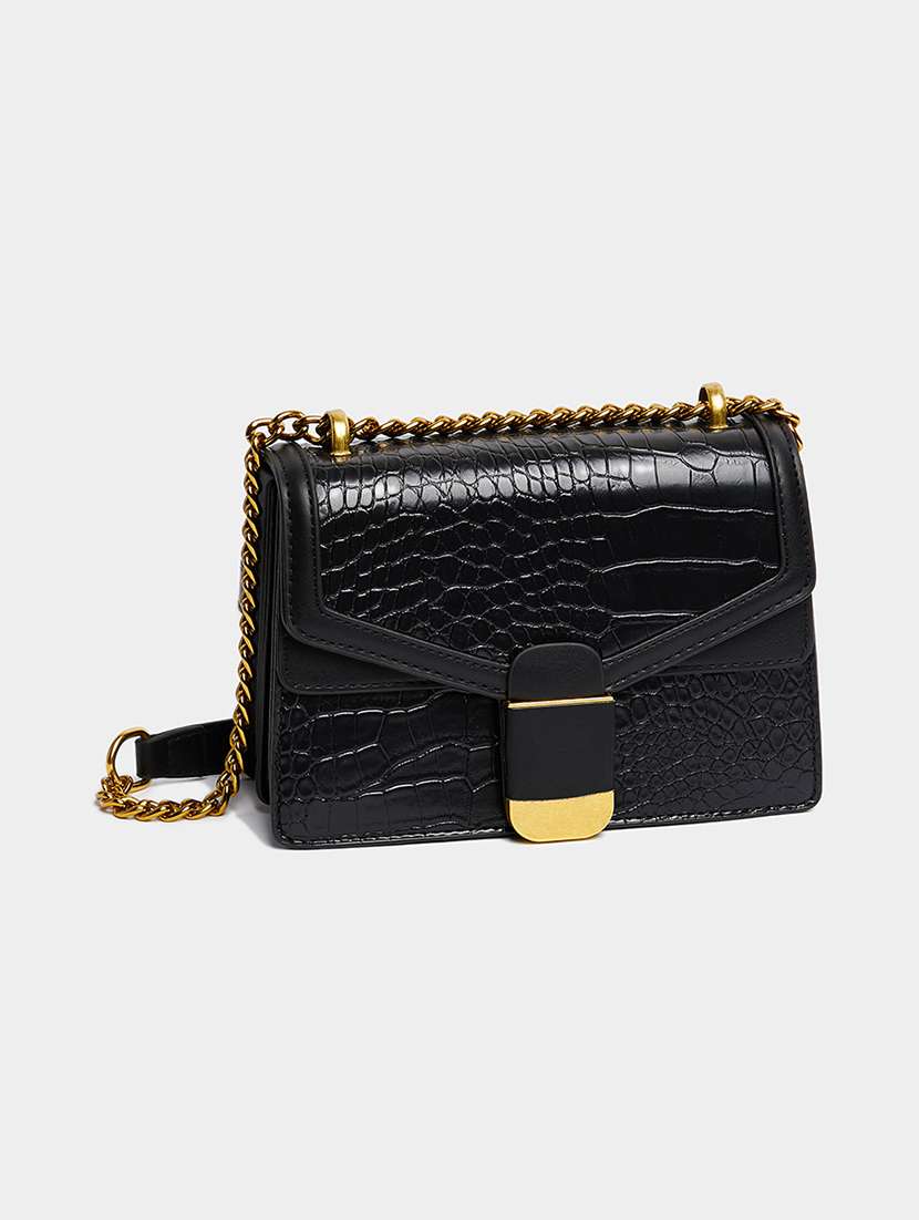 women black textured pu sling bag