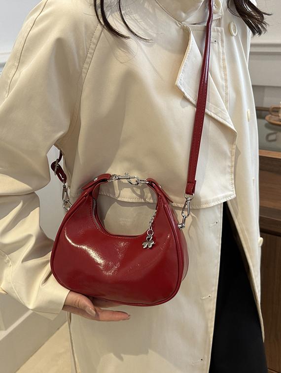 red lock detail shoulder baguette handbag - 21971299 -  Standard Image - 1