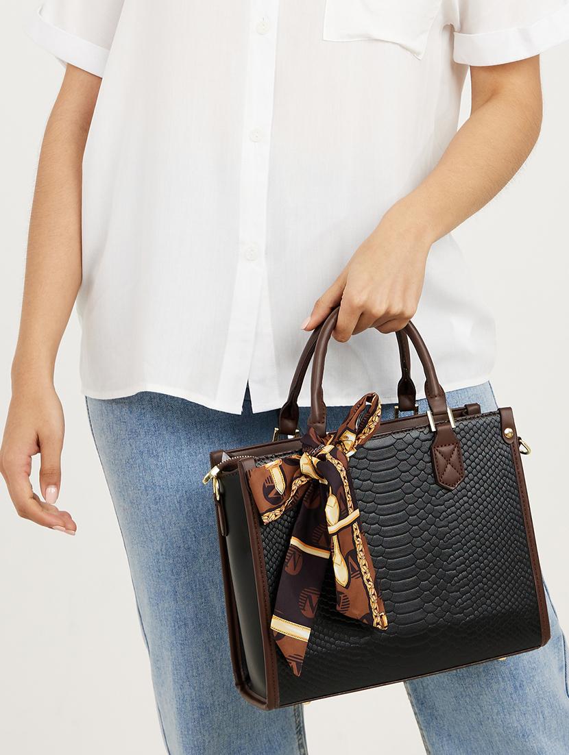 black pu handbag with bow detail - 21971372 -  Standard Image - 1