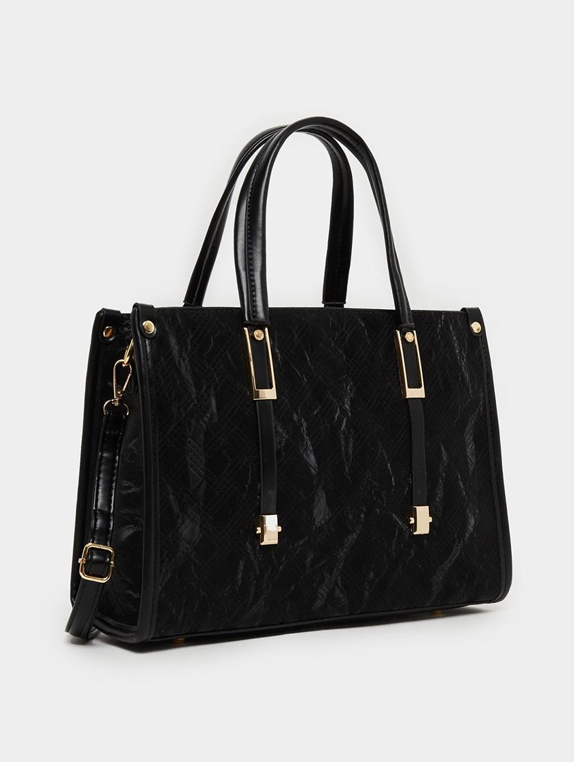 black textured pu leather handbag - 21971438 -  Standard Image - 1