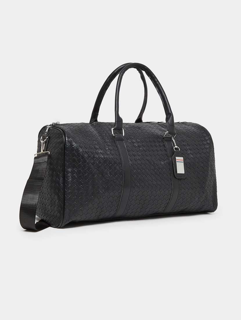 black textured weave pattern duffle bag