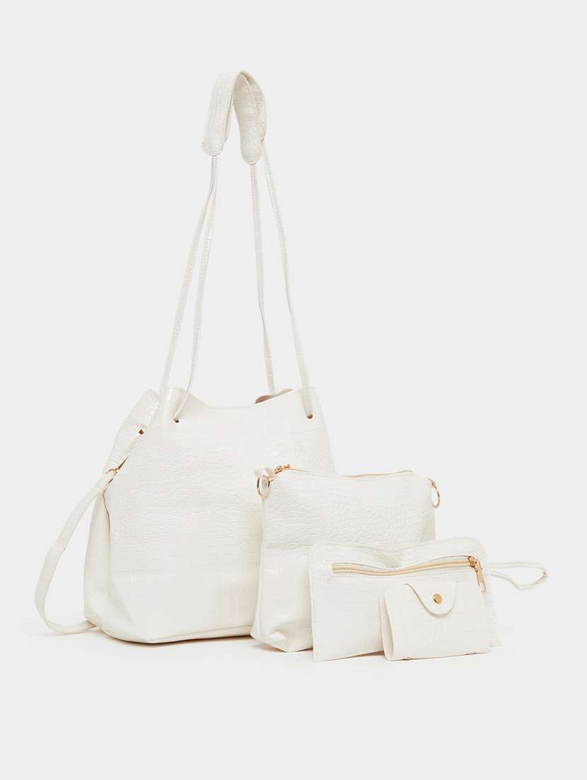 white textured handbag set of four