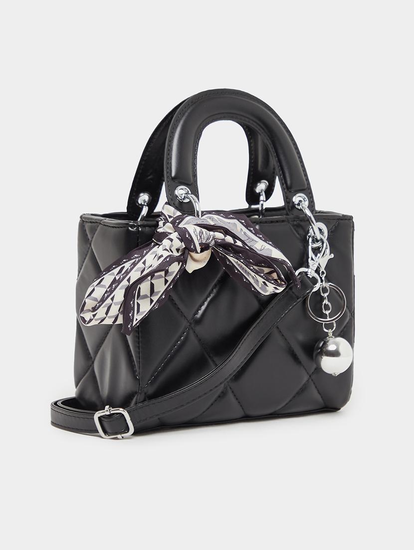 black quilted textured party handbag - 21971475 -  Standard Image - 1