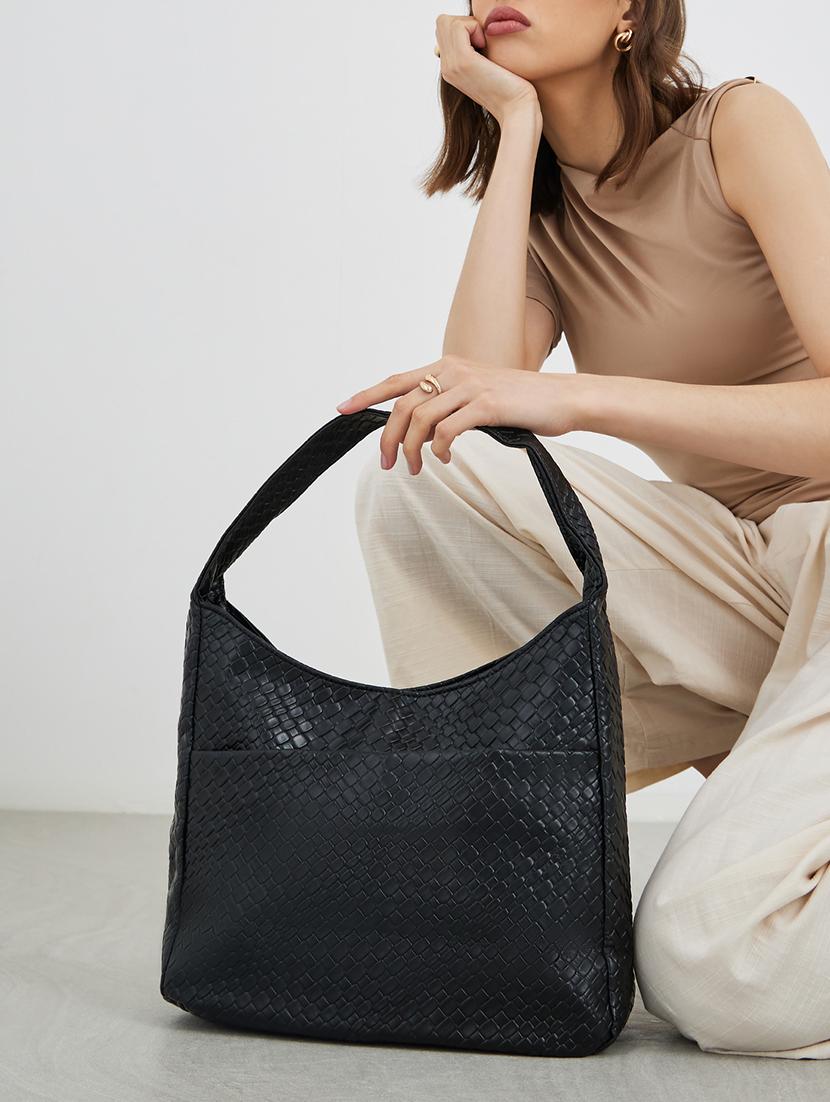 black textured shoulder bag with pockets - 21971495 -  Standard Image - 1