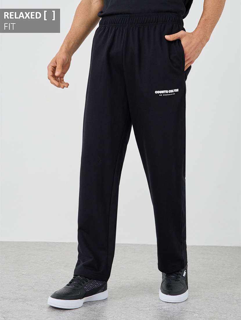men solid mid rise relazed fit track pant
