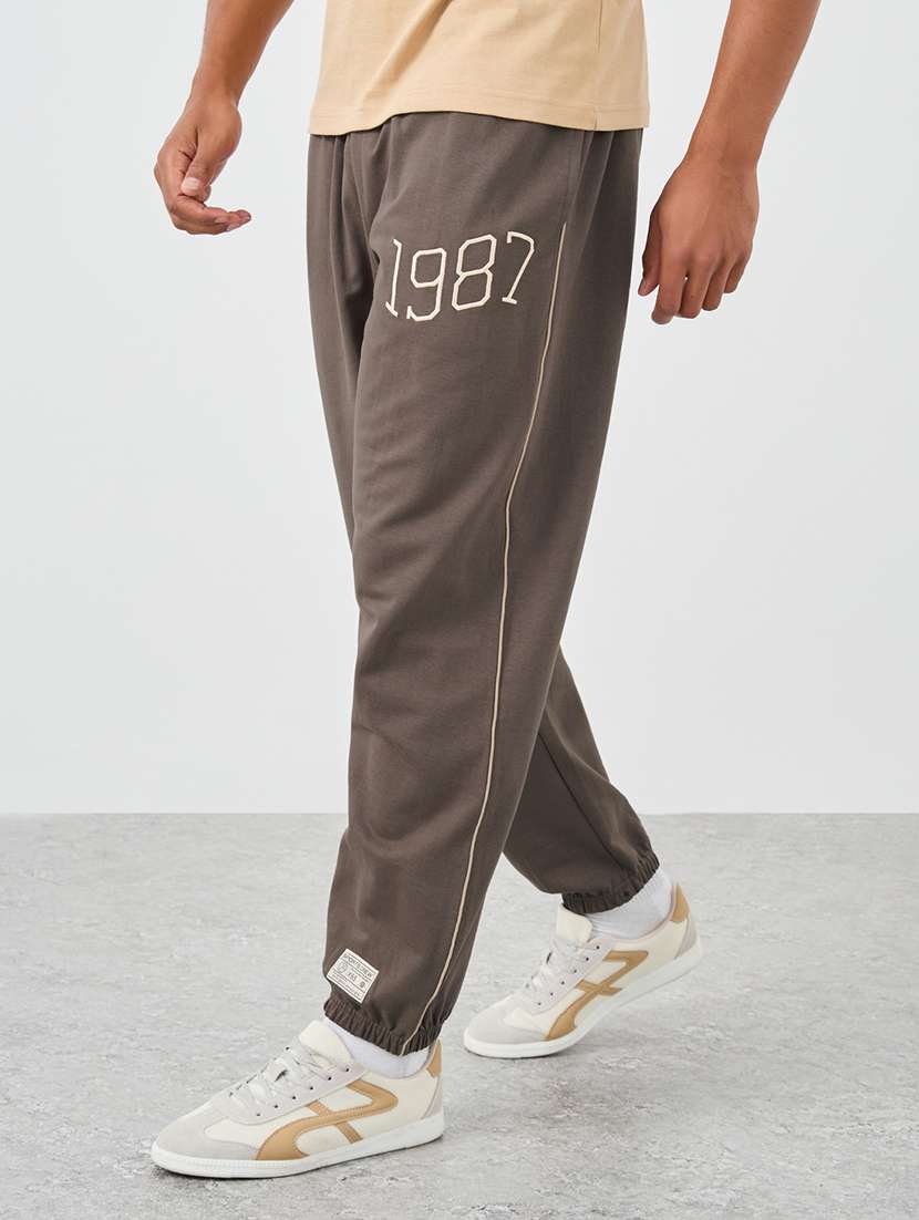 men typographic mid rise relaxed fit jogger - 21971571 -  Standard Image - 1