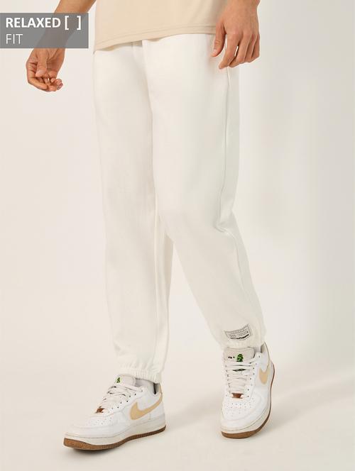 men solid mid rise relaxed fit jogger - 21971692 - Standard Image - 0