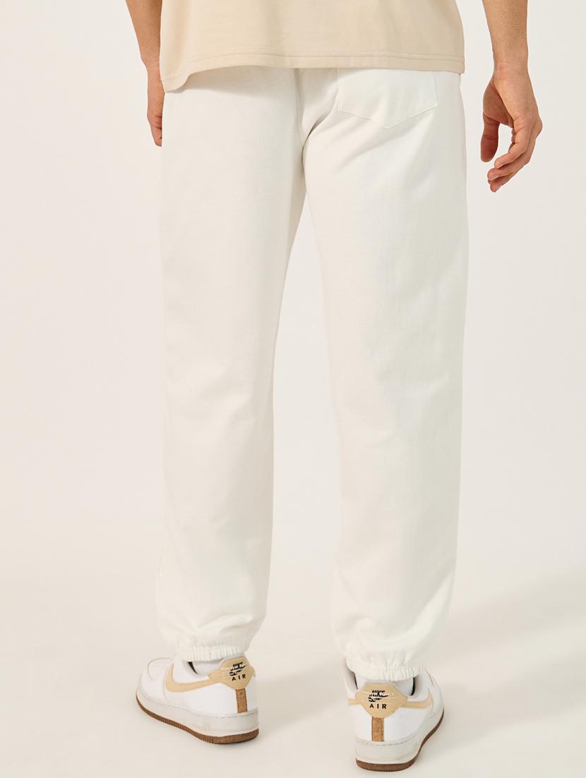 men solid mid rise relaxed fit jogger - 21971692 - Standard Image - 1
