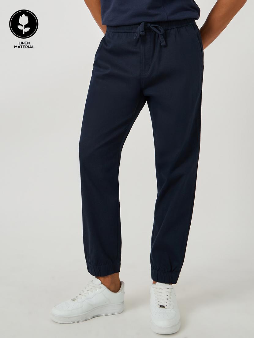 men solid mid rise relaxed fit jogger - 21971706 - Zoom Image - 0