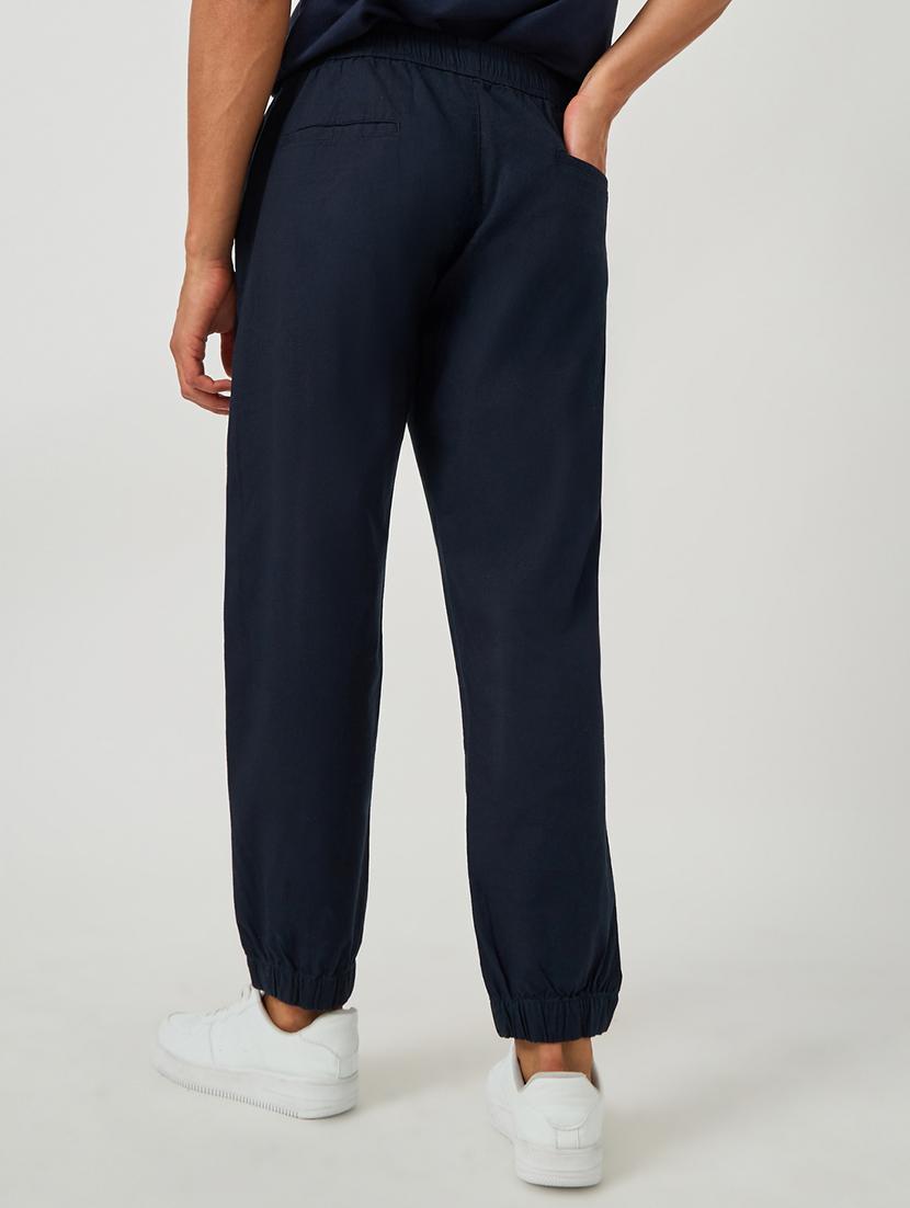 men solid mid rise relaxed fit jogger - 21971706 - Standard Image - 1