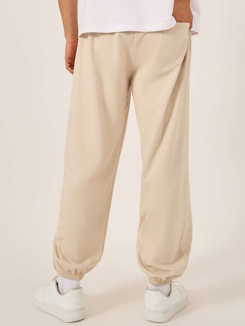 men solid mid rise relaxed fit jogger - 21971716 -  Standard Image - 1