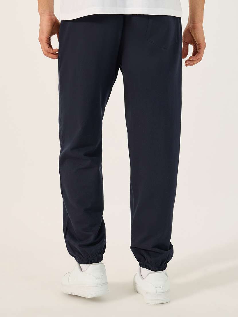 men printed mid rise relaxed fit jogger - 21971734 -  Standard Image - 1