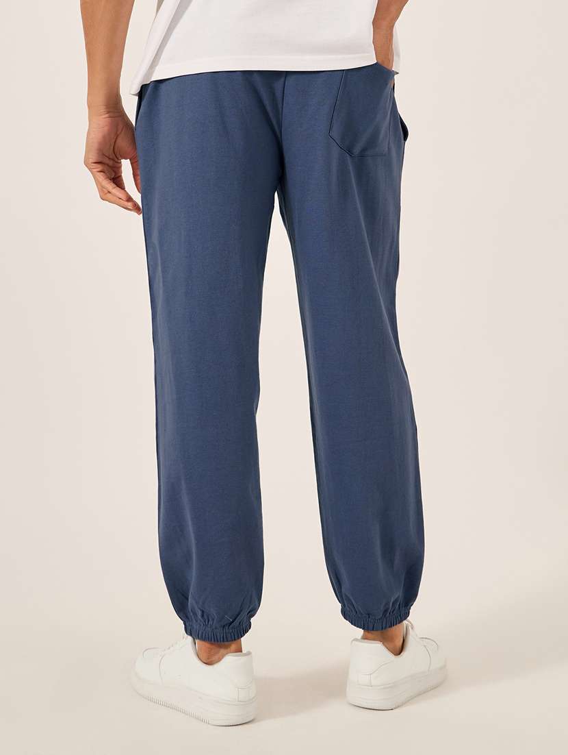 men printed mid rise relaxed fit jogger - 21971735 -  Standard Image - 1