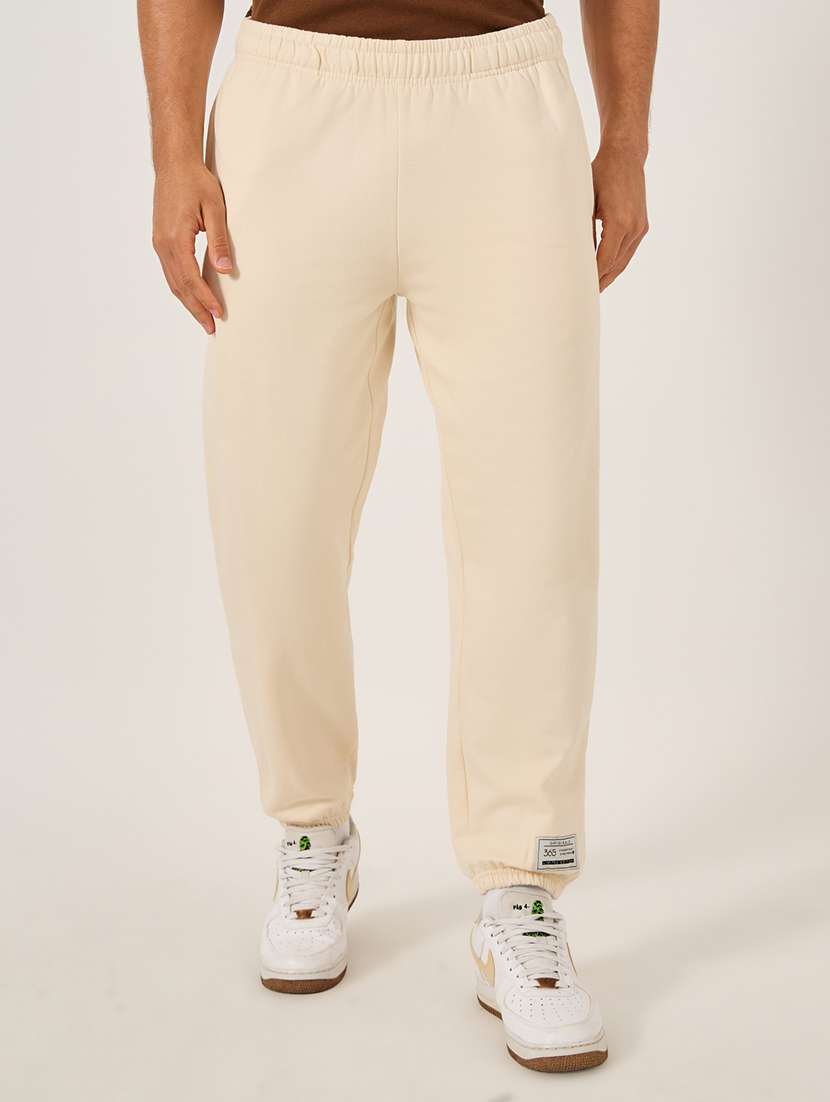 men solid mid rise relaxed fit jogger - 21971742 -  Standard Image - 1