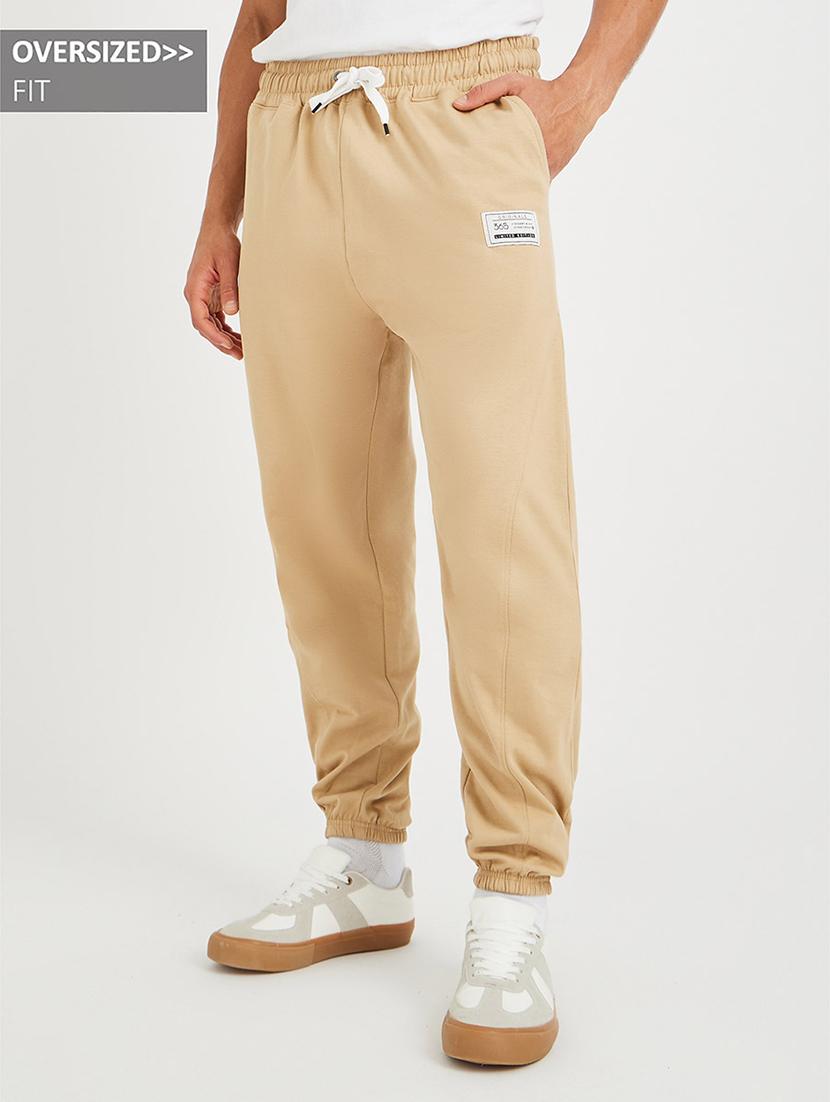 men solid mid rise relaxed fit jogger