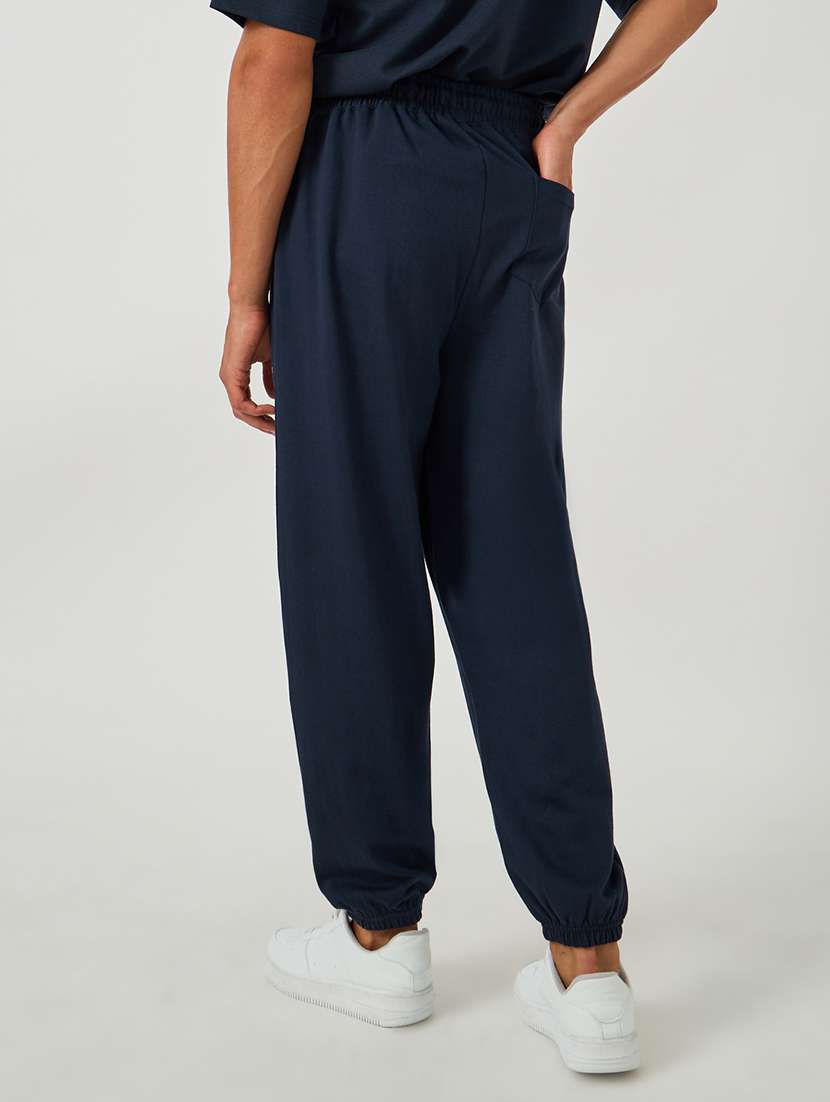 men printed mid rise relaxed fit jogger - 21971754 -  Standard Image - 1