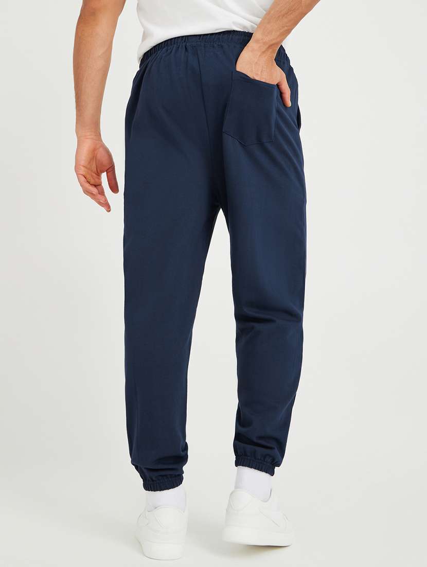 men printed mid rise relaxed fit jogger - 21971756 -  Standard Image - 1