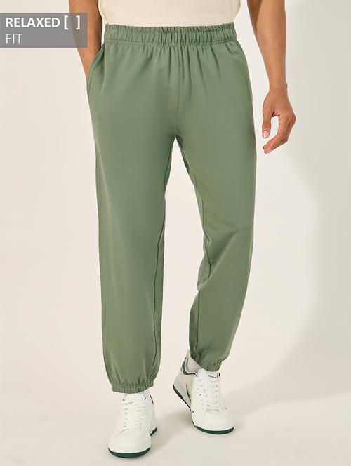 men solid mid rise relaxed fit jogger - 21971758 - Standard Image - 0