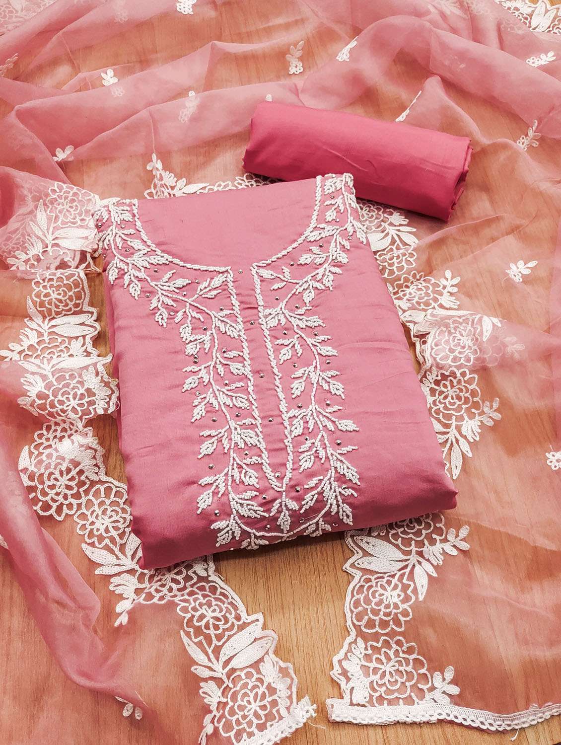 women solid with work embroidered unstitched suit set