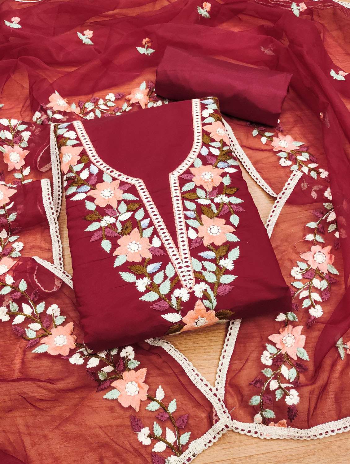 women solid with work embroidered unstitched suit set