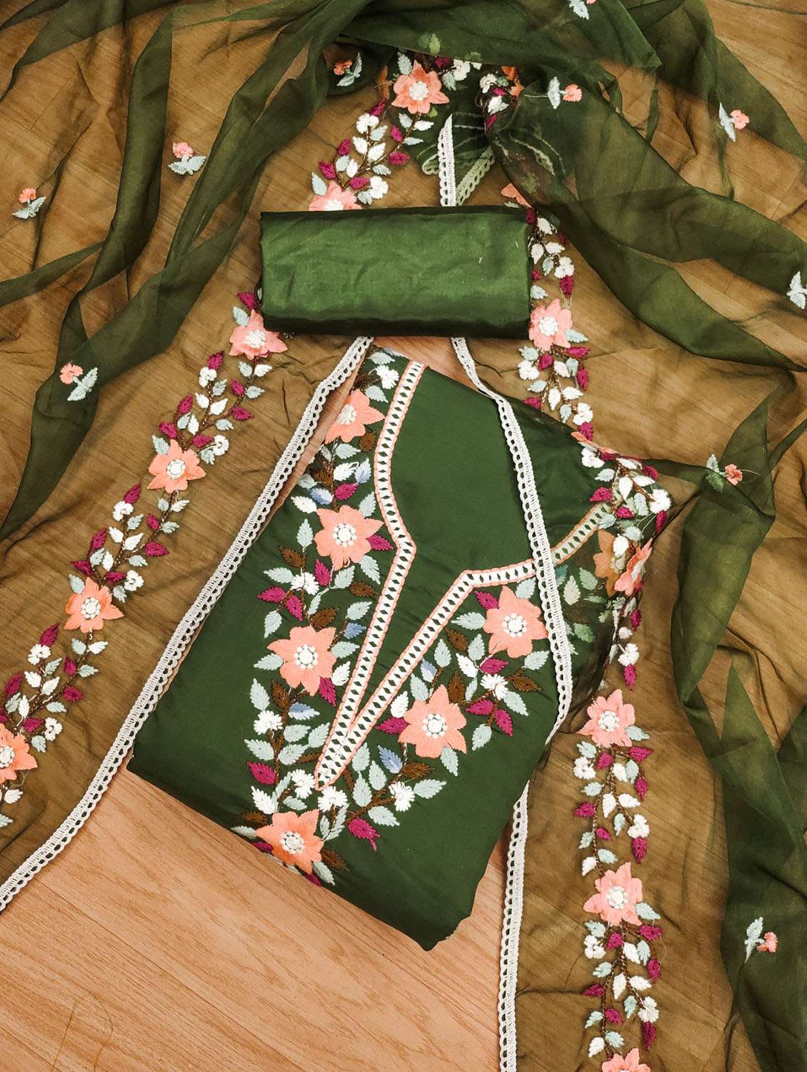 women solid with work embroidered unstitched suit set