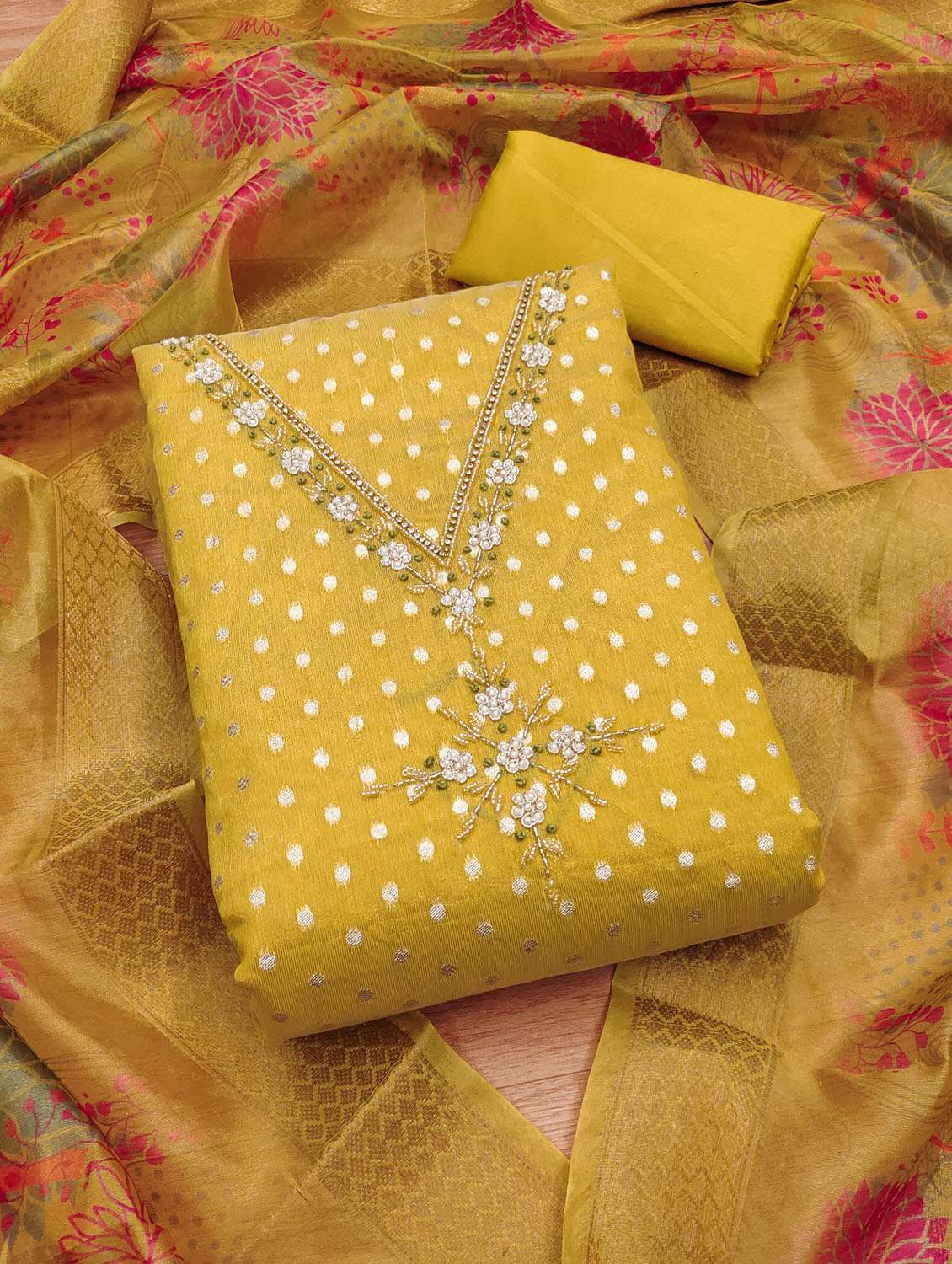 women self design embroidered unstitched suit set