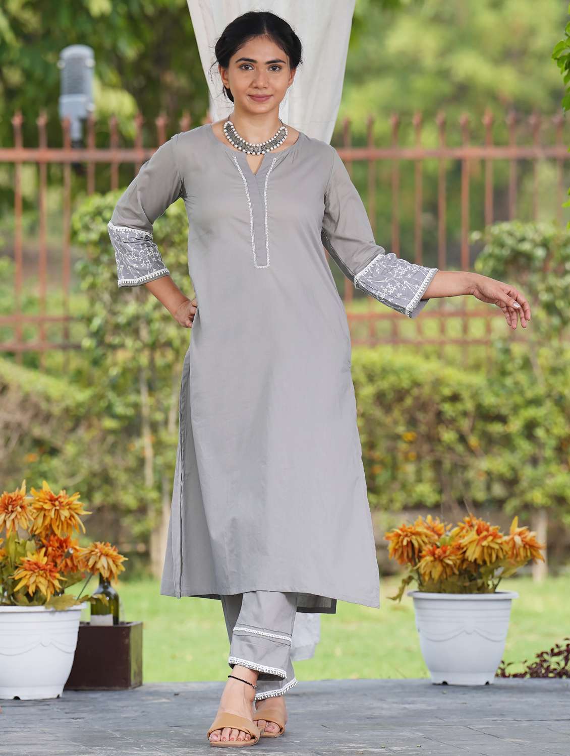 women solid with work three quarter sleeve a-line kurta