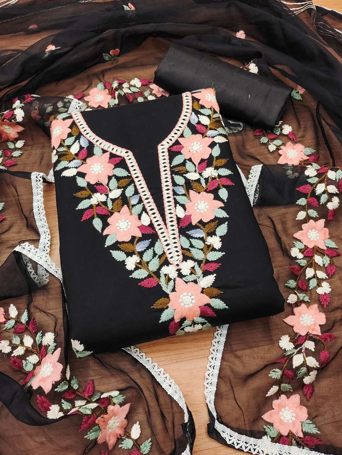 women solid with work embroidered unstitched suit set