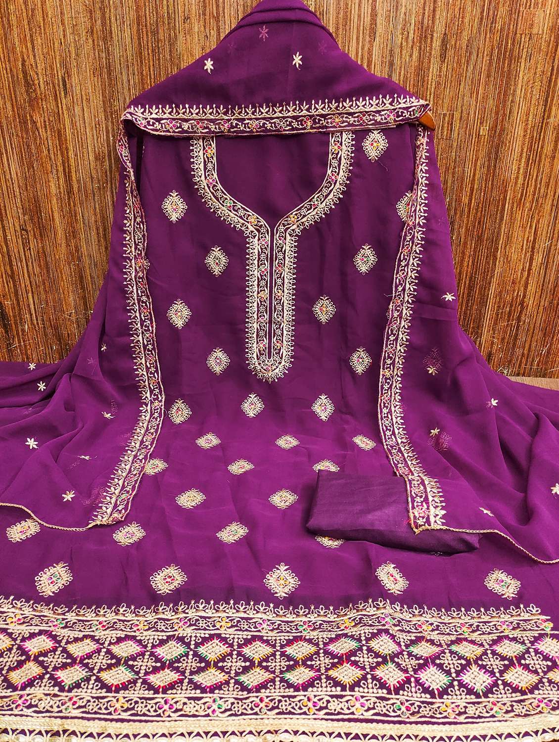 women solid with work embroidered unstitched suit set