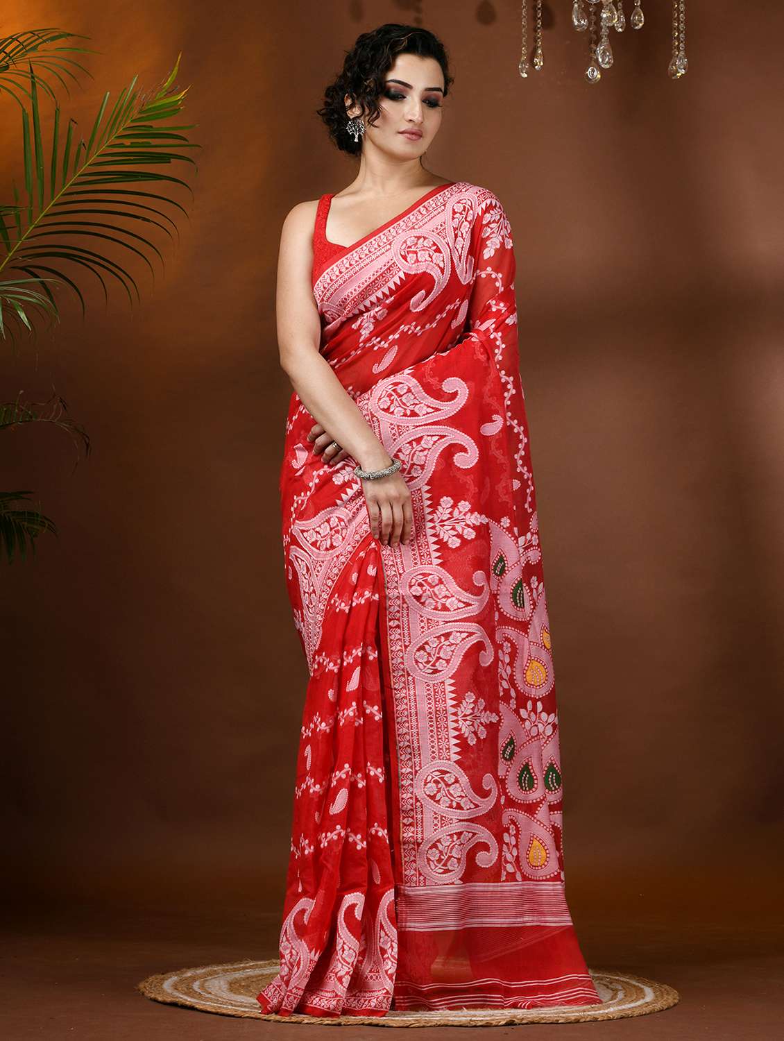 women red jamdani saree