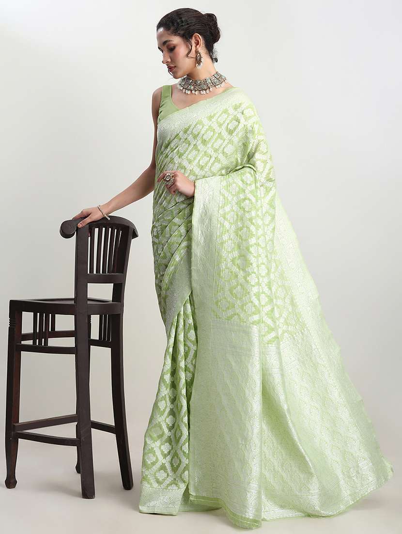 women self design banarasi saree with blouse