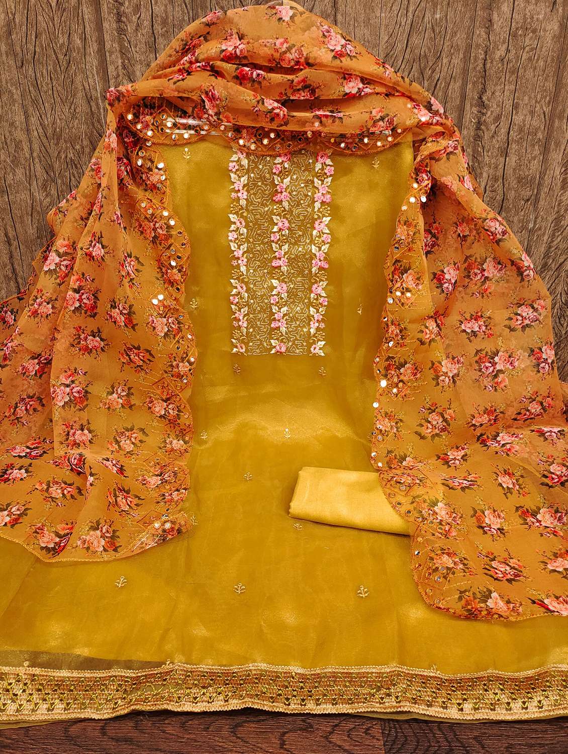 women solid with work embroidered unstitched suit set