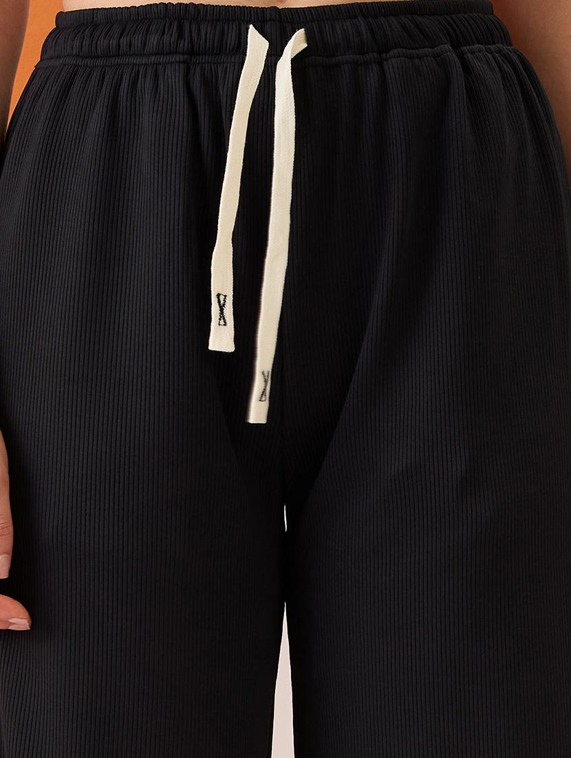 women black self design mid-rise stretchable straight fit trousers - 21980145 - Standard Image - 4