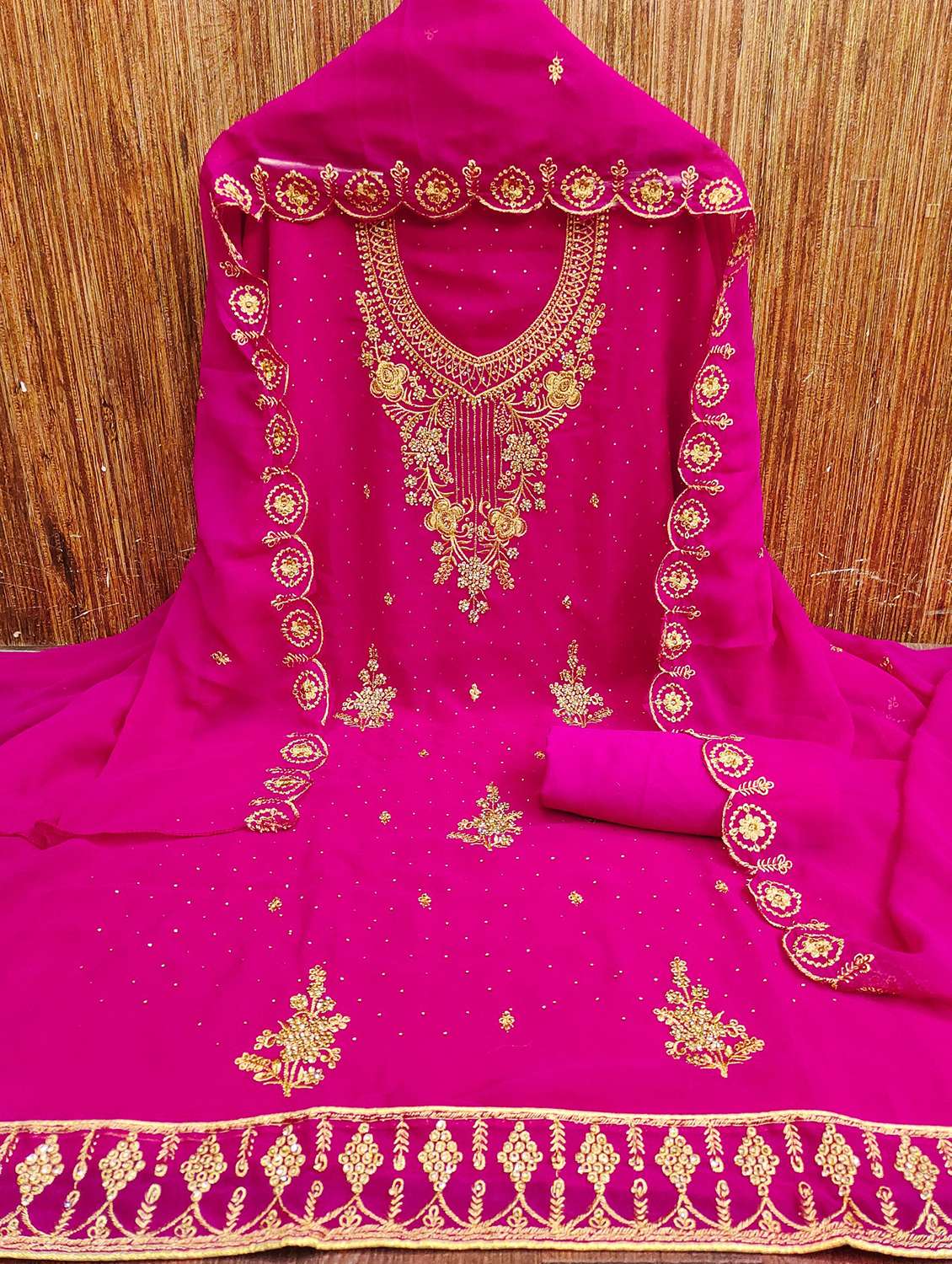 women solid with work embroidered unstitched suit set