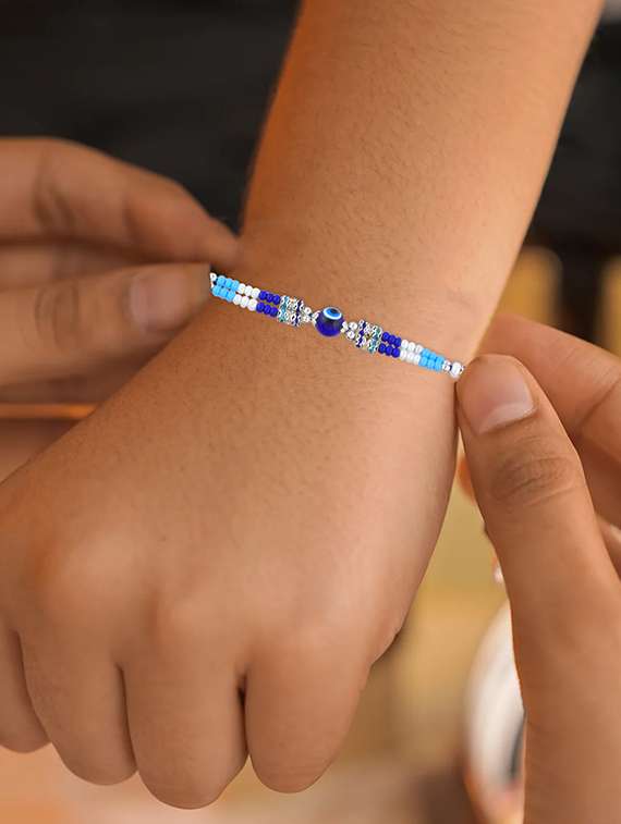 pack of 2 evil eye rakhi set with roli and chawal - 21981763 - Standard Image - 1